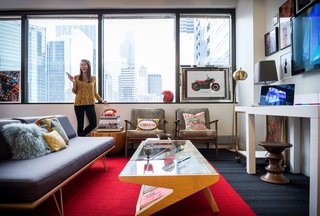 This is How You Combine Modern Architecture, Flea Market Finds, and Art All Together - Photo 7 of 8 - Recently, Surratt has been making the office feel more like home. "A lot of our projects are inspired from what we do outside of the office walls and it was inevitable that at some point we would furnish the space like this." she says. 