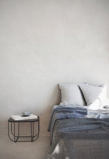 The Square Bed Throw by A Hint of Neon is woven out of 100 percent Merino wool. Coming from the world of Danish fashion, founder and designer Kristine Engelbrechts really knew how to translate a quality material into a touchable and lush everyday throw.