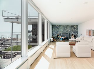 Early on, the house's simplicity had great appeal to Jan Sasseen, the current owner. From walls to rugs to furniture, "pretty much everything is white," she says. "When I was decorating, I picked the most basic things I could find. Nothing had details or frills."