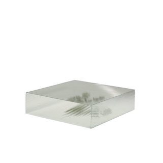 Reeded table by Staffan Holm Textured glass is the secret behind this block’s seemingly rippling surface. A hollow core enhances the moiré effect. 