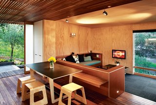 Designer Tim Webber created the dining table and stools.