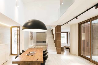 Modern and Mediterranean architectural styles are not always in harmony, but both schools value clean, white materials. 