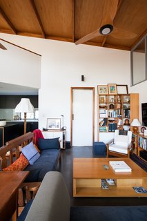 The house was designed with an open floor plan to facilitate aging in place. </p><p><font color="#cccccc"><span style="font-size: 13px; line-height: 26px;">Courtesy of Mountford Architects</span></font></p><p><font color="#cccccc"><span style="font-size: 13px; line-height: 26px;"><br></span></font> <span style="font-family: 'Milo Serif Pro', serif; font-size: 22px; line-height: 1.8;">The living room is capped by a sloping plane of oiled LVL (laminated veneer lumber) and plywood. The angle of this high ceiling is oriented to the north, with a combination of cross ventilation, thermal massing, and sun shading devices used to passively achieve a comfortable temperature. Charcoal-burnished concrete floors also help absorb excess heat. </span>