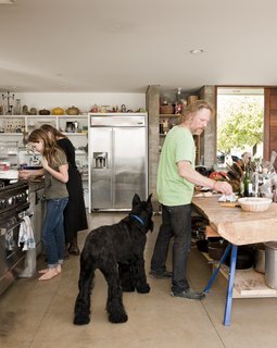 The family needed space not just for cooking, which they do a lot of, but for massive kitchen projects like making wine from their homegrown grapes and oil from their olive trees. 