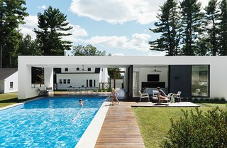  A prefab pool and guesthouse designed by LABhaus frames views of a Massachusetts property’s original structure, a Dillman model Sears Roebuck kit house from 1928. 
