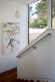 Not the Eichler Post-and-Beam Style You Know - Photo 5 of 7 - Large walls of glass facing the courtyard were original to the design.