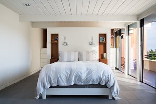 Not the Eichler Post-and-Beam Style You Know - Photo 4 of 7 - The design team decided to combine two smaller bedrooms into one more comfortable master suite with a large closet and dressing area. They also eliminated a fourth bedroom, further improving the circulation of the house.