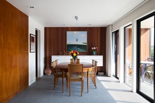Not the Eichler Post-and-Beam Style You Know - Photo 2 of 7 - Mahogany paneling, original to the house, was reused as much as possible.