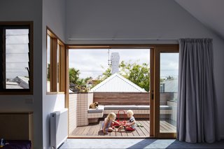 It Looks Like a Playland but This Home Works Hard - Photo 9 of 10 - A small roof terrace offers a second outdoor enclave for play. 
