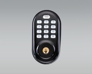 These Modern Parents Show How Invaluable Technology Can Be - Photo 5 of 12 - To ensure their kids are able to play freely and safely within their home, Matthew and Jesse installed two of SAGE'S Deadbolt Locks. By connecting them to the SAGE by Hughes app, they’re able to automatically lock or unlock their doors no matter where they are. To fit within the design of your home, they’re available in a brass, nickel, or bronze (shown here) finish. 