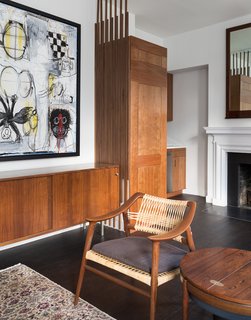 A significant art piece by Dana Louise Kirkpatrick and Bernie Taupin anchors the living room.