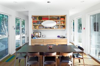  "You can get a really nice cross-breeze," says Debbi Gibbs of her home, situated to capitalize on its lakefront parcel. "If you open the sliding doors on both sides you really feel like the whole house is open." 