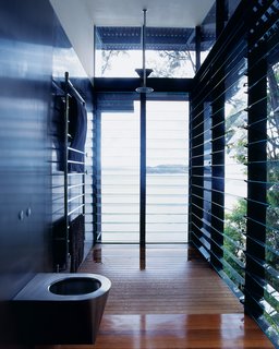 Three Glass-and-Copper Pavilions Conquer the Cliffs - Photo 10 of 10 - Even the master bath is open to the surrounding water. 