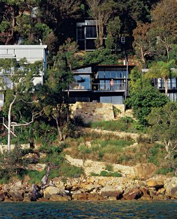Three Glass-and-Copper Pavilions Conquer the Cliffs - Photo 4 of 10 - Set high on a cliff along the south end of the beach, this residence of three glass-and-copper pavilions offers a mighty reward for conquering the steep ascent.