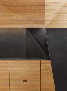 Fractal alcoves punctuate the cabinetry.