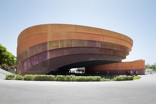 Design Museum Holon, Israel's national design museum, hosts a retrospective exhibition of Japanese studio Nendo, on view through October 29, 2016. The museum, designed by Ron Arad Architects, features five curved bands of Cor-Ten steel that frame a central courtyard space, a fitting backdrop for the minimalist geometries found in Nendo principal Oki Sato's work.