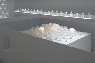 Lighting, products, and furniture by Nendo are featured in the display, which captures six "in between spaces" that inform the studio's design process.