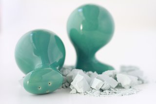 Ceramic salt and pepper shakers by the designer. 