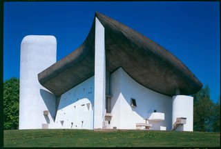 The sculptural Notre-Dame du Haut is unlike any other of the buildings by the architect. Built to replace a church after World War II, the modern chapel was designed to be a somber space that relies on the expressive form of the structure and use of nature light to create moments of reflection for visitors.