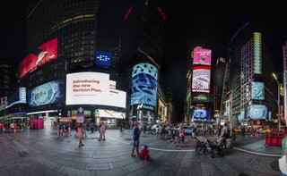 Times Squares Transforms Into a Surreal Fish Tank at Night - Photo 4 of 6 - The contrast between Stanton's visual vocabulary and Times Square helps create the effect of viewing another world through a window. The Nasdaq screen stands out in particular since it wraps around the whole building. 