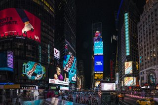 Times Squares Transforms Into a Surreal Fish Tank at Night - Photo 3 of 6 - A porthole view of the ocean appears before tentacles wrap around it and lead the viewer to the bottom of the sea. 