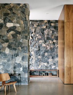 The two basalt layers, meanwhile, showcase American black maple and polished concrete floors. 
