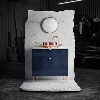 "We adore this clever take on the IKEA Metod cabinet, upgraded with S's drawer handles, legs, and tops."