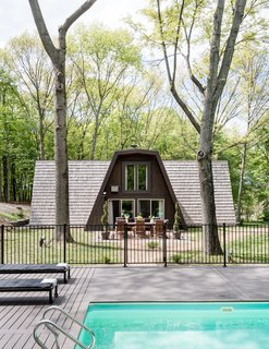 One Couple's Imagination Goes Wild at a 1967 Weekend Retreat - Photo 1 of 12 - In search of relaxation, Cain Semrad and Damen Seminero happened instead upon a home improvement challenge: a pine-covered "rhombus-frame" house built in 1967. 