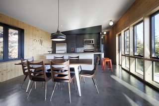House of the Week: Whale Watching at This Edgy Abode - Photo 1 of 2 - Materials throughout the house are elemental, befitting its wilderness setting. The walls are made of cross-laminated timber and the floors are slabs of heated concrete.