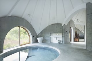 Moving past the kitchen, the homeowners and guests can access the spiral pool. The wide hallway accommodates visitors with wheelchairs. 