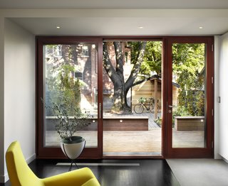 The wide doorway leads out onto a deck and is a prime spot for the family to relax or play. 