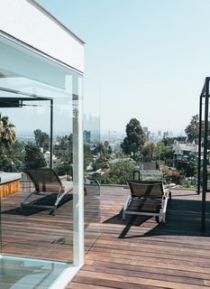 While trying to preserve the design intention of the original Buff, Straub and Hensman home, architect Don Dimster added important extras, like a gorgeous rooftop terrace. 