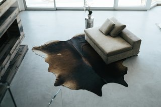 The interior is strikingly airy and minimally furnished. 