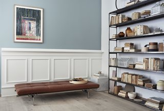 Kjærholm was influenced by the Barcelona Pavilion and the complementary furniture by Mies van der Rohe. Again, the matte-steel frame with its exposed joints is on full display at the company's flagship showroom in Copenhagen. As a continuation of his material vocabulary, the base is connected by rubber fasteners and screws. 