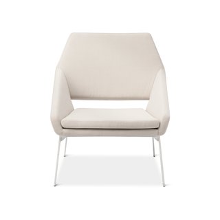 <b>Lounge Chair, $249.99.</b> Thinking of "a hybrid between a chair with no arms and a chair with arms," Deam explains, resulted in this lounge seat, which features steel legs and tall, foam-cushioned sides that comfortably cradle the user.
