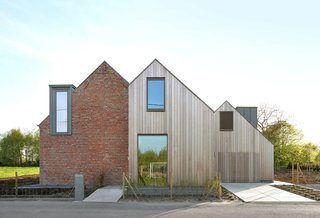 Via Architizer, photo by Filip Dujardin