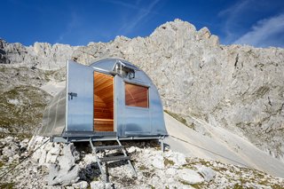 Via ArchDaily, photo by Anze Cokl