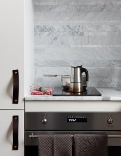At His 350-Square-Foot Apartment, Small Space Champion Graham Hill Practices What He Preaches - Photo 8 of 15 - The kitchen features a Smeg oven and Ramblewood induction range.