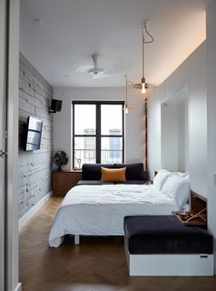 At His 350-Square-Foot Apartment, Small Space Champion Graham Hill Practices What He Preaches - Photo 11 of 15 - At night, the living-dining area converts into the primary bedroom. 