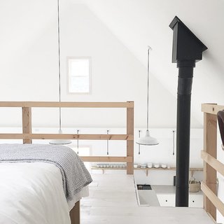 Instagram We Love: Modern-Rustic Goals - Photo 2 of 4 - A view of the kitchen from the couple's lofted bedroom. 