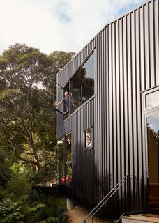 Milton cracks open a window oriented to balance solar gain with a cooling stack effect. 