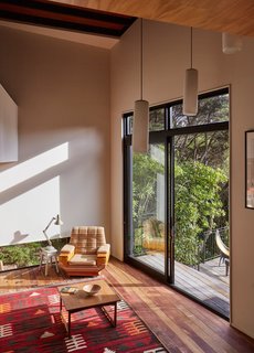 In keeping with the spirit of the house, the furniture is humble—most is vintage, like the Anglepoise lamp that sits on a stool near a colorful kilim