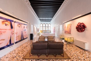 The main living area of the home features Venetian terrazzo flooring. 