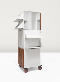 What if Furniture Worked Like a Swiss Army Knife? - Photo 1 of 3 - Agile transitions define Stephen Kenn’s new line for Victorinox. Each side of the three independently rotating cubes that make up the Storage Column has a different use: The first is a mirror, the second houses a walnut cabinet, the third contains pull-down shelving, and the forth is for posting notes. Castors make the unit mobile.
