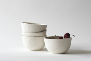 WantedDesign Holiday Market 2016 - Photo 1 of 6 - Woodgrain bowls, slipcast porcelain from hand-turned wood pieces, by Abigail Murray.
