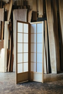 The Hanafusas' specialty is the double-sided shoji, which has a removable second frame that sandwiches the paper. The style has the added benefit of being sturdier than classic single-sided shojis. 