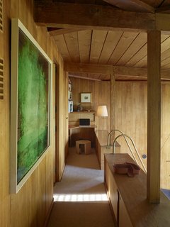 Entering the small open sleeping loft on the top floor.