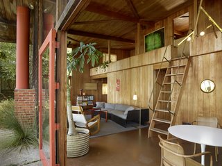 "Unbelievably, almost everything in the house is original—down to the kitchen paper towel holder and the repurposed WWII ship ladder that takes you to the second level." -Charles de Lisle 