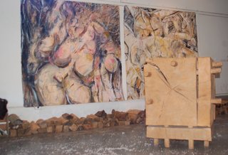 Creatives of the Bay Area Series: Evan Shively and Madeleine Fitzpatrick - Photo 8 of 10 - Two of Fitzpatrick's paintings are shown here, alongside a sculpture by David Nash titled, Cracking Box. 