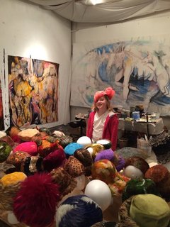 Creatives of the Bay Area Series: Evan Shively and Madeleine Fitzpatrick - Photo 9 of 10 - Shown here is a visitor in Fitzpatrick's art studio, where they house their collection of vintage feather hats from the mid-1950s to the 1970s—many of which are vintage Dior. 